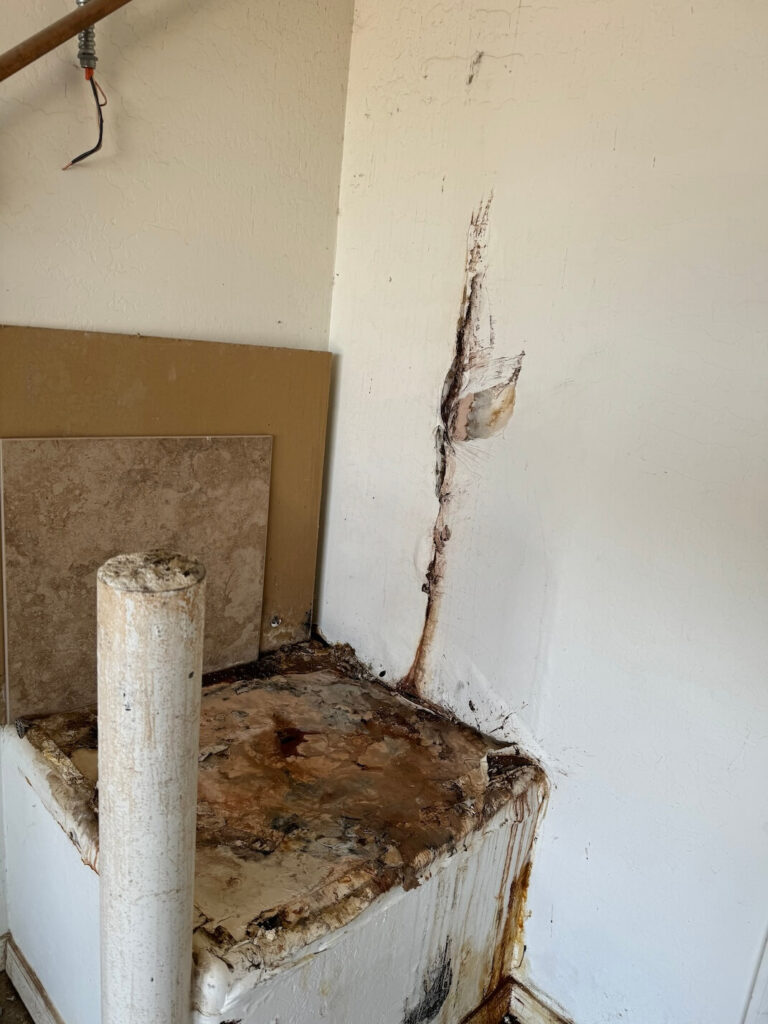 busted water heater damage